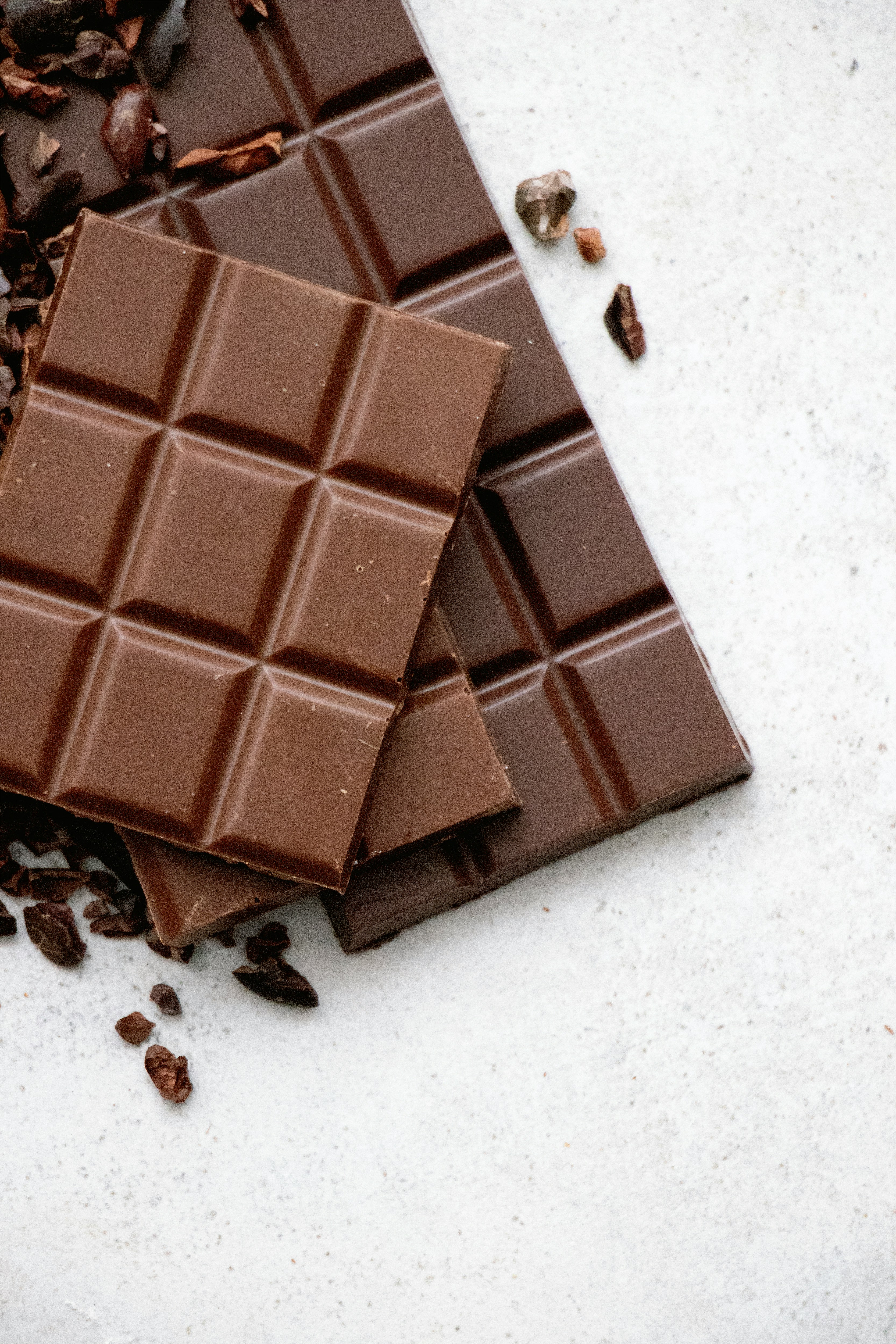 Dark Chocolate, Photo by <a href="https://unsplash.com/@tetiana_bykovets?utm_content=creditCopyText&utm_medium=referral&utm_source=unsplash">Tetiana Bykovets</a> on <a href="https://unsplash.com/photos/chocolate-bar-on-white-table-TzN2odwnesg?utm_content=creditCopyText&utm_medium=referral&utm_source=unsplash">Unsplash</a>    